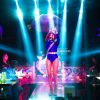 A singer performs in a night club in Kunming, China's southern Yunnan province, Feb. 22, 2015. Club owners there often hire singers and dancers to entertain the customers.