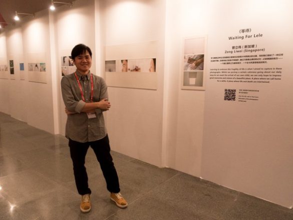 Zeng Liwei at the exhibition of his Mentorship Project at the China-ASEAN Photography Festival in Nanning China.