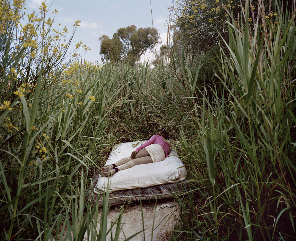 Anna, a Nigerian sex worker on her makeshift bed on the fringes - Invisible  Photographer Asia (IPA)