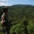 A soldier with the Kachin Independence Army (KIA) stands on a mountain near where the Myanmar government's troops are deployed.
